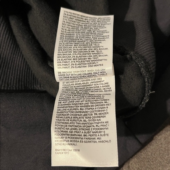 The North Face Charcoal Hoodie with Vibrant Orange Sleeve Design - Picture 10 of 14